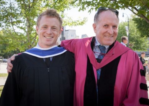 New grad Andrew Bala, Law’17, and his dad, Professor Nick Bala, Law’77, outside Grant Hall after the Convocation ceremony. (Photo by Greg Black)