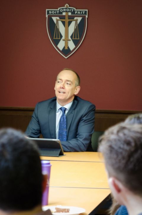 Justice Grant Huscroft, Law’84, responds to a question at a Q&A held in Macdonald Hall on Jan. 18.