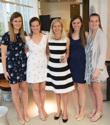 Accepting the Ryan Award on behalf of the late Stephen Sigurdson, Law’84, are his wife, Leslie, Law’84 (middle); and their daughters, Amy (Com’15); Laura, Law’13; Claire (Com’12); and Heather (Harvard student). (Photo by Studio66)