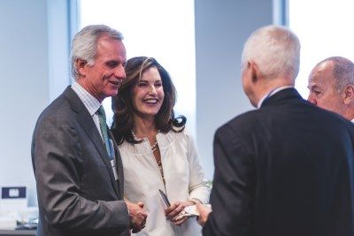 Corry Award winner Leslie O’Donoghue, Law’88, and fellow grads reconnect at the Queen’s Law reception in Calgary on May 2.