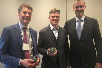 Peter Johnson, Law’89, and Stuart O’Connor, Law’86, accept the Corry Award from Dean Bill Flanagan. The award recognizes their efforts as co-chairs of the Queen’s Law Alberta Alumni Council, a group responsible for leading their province’s support, vision and philanthropic efforts in support of Queen’s Law.